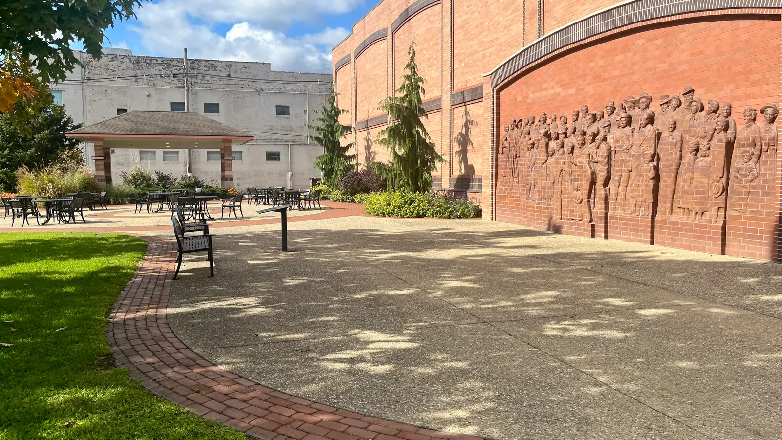 A public plaza with a sculpted brick mural in downtown Danville, Illinois