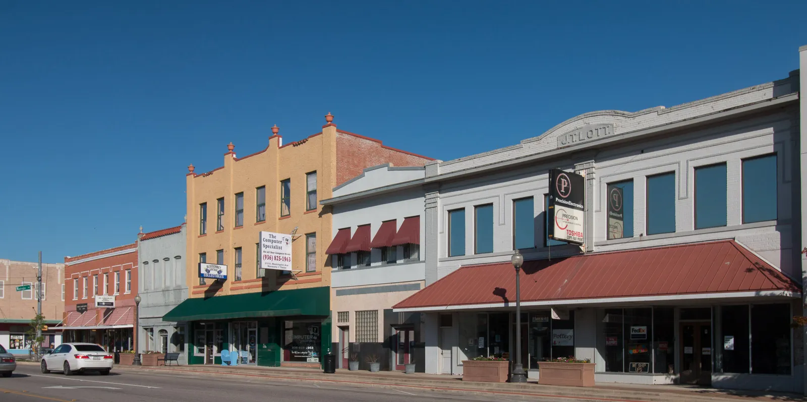 Historic storefronts along the main commercial street in downtown Navasota, Texas