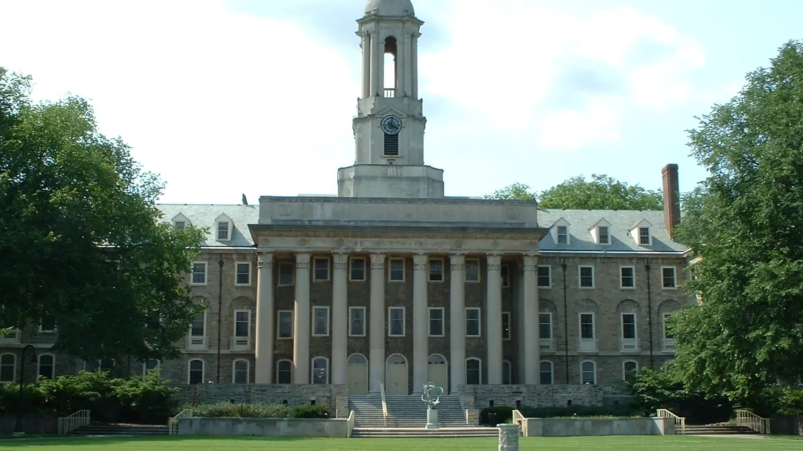 Old Main, Penn State's iconic administration building, on a summer day