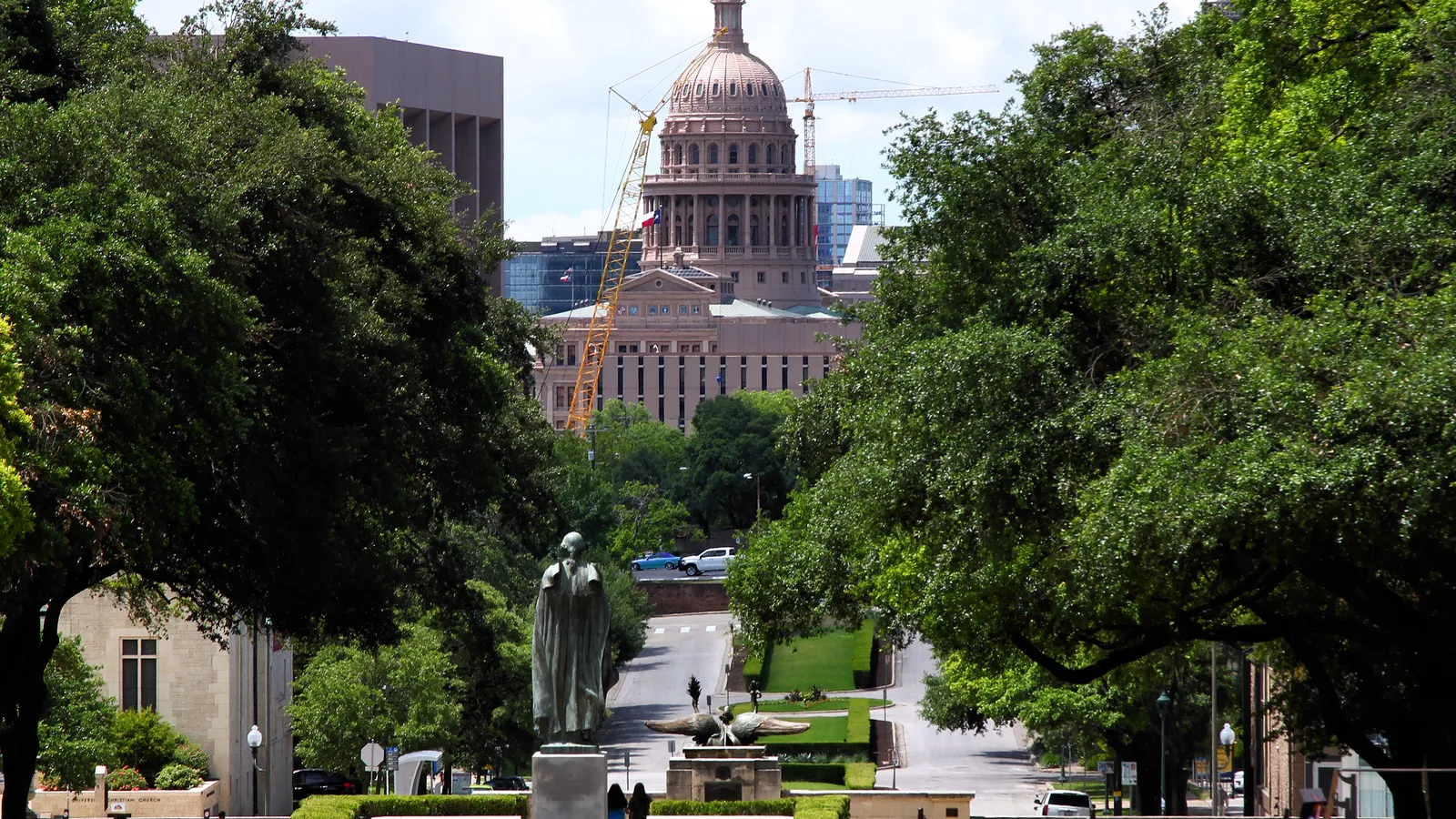 The Texas State Capitol dome viewed from UT Austin's South Mall