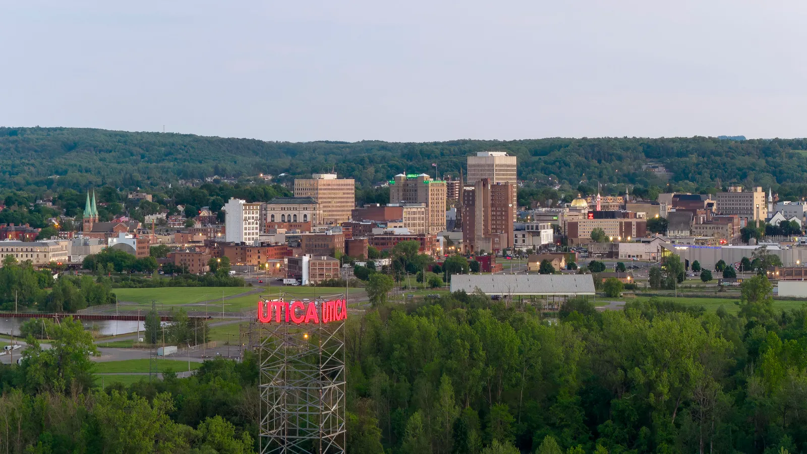 The illuminated Utica, New York skyline at dusk